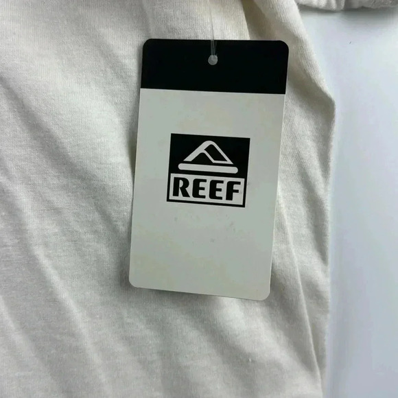 REEF SHORT SLEEVE NWT SZ L CRÈME COLORED WITH A GREAT BOTTLE GRAPHIC ON BACK - Picture 3 of 6